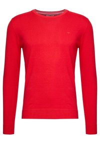 Pull rouge à manches longues en tissu tricoté doux. Il présente un col rond classique ainsi que des poignets et un ourlet côtelés. Logo de la marque discret sur la poitrine.