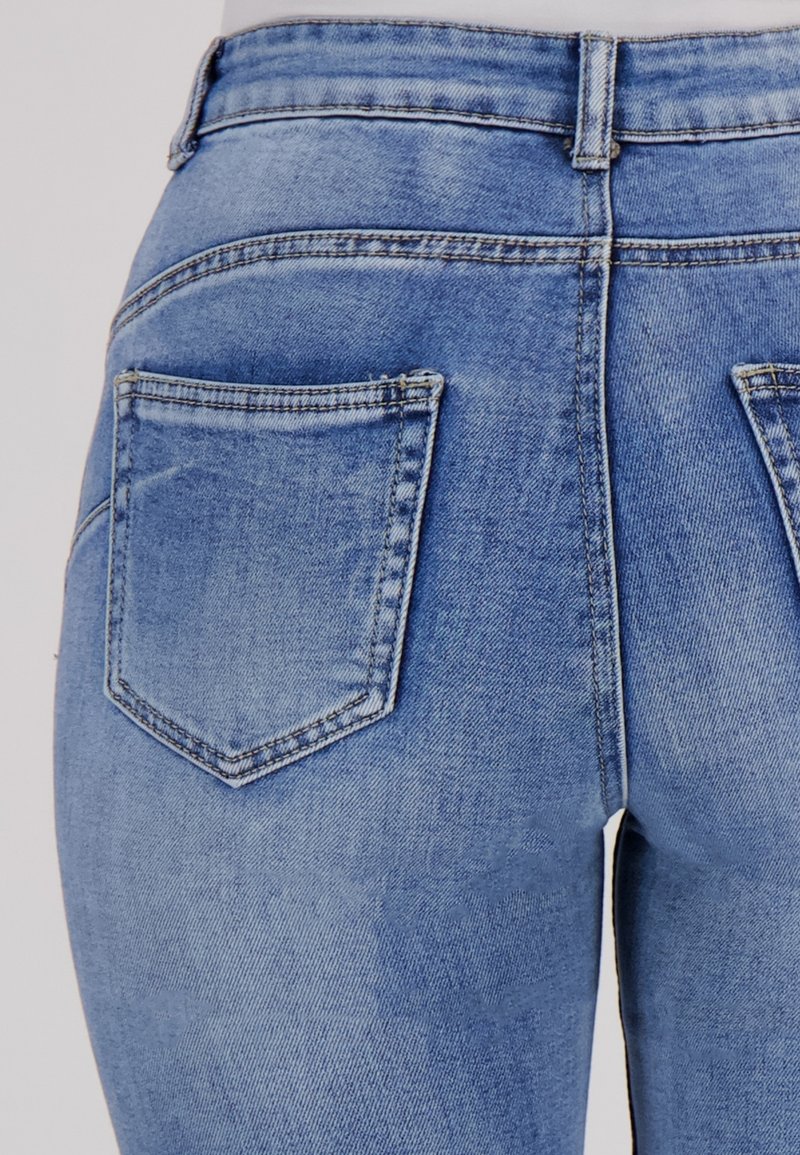 ICON hippie gescheurde slim fit stretch heren jeans met verfspatten