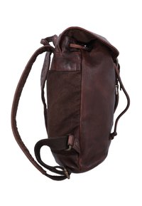 Brown leather and fabric backpack with adjustable straps and a drawstring closure, shown from the side on a white background.