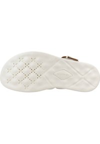 Suela de sandalia ligera en goma blanca con un patrón texturizado de cruces y puntos, con un logo de Geox embosado cerca del talón.