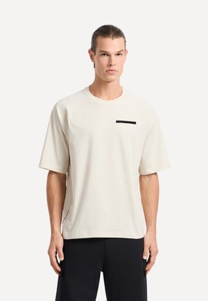 T-shirt con stampa - beige