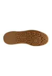 Braune Gummisohle von Sneakers mit strukturierten Mustern, kreisförmigen Akzenten und Branding in der Mitte. Auffälliges Profil für besseren Halt.