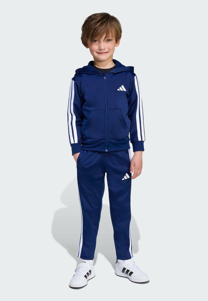 adidas SPORTSWEAR ESSENTIALS TRACKSUIT KIDS UNISEX SET - Tracksuit - dark blue/white