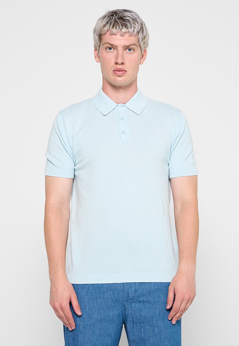 United Colors of Benetton Poloshirt lichtblauw United Colors of Benetton Poloshirt lichtblauw