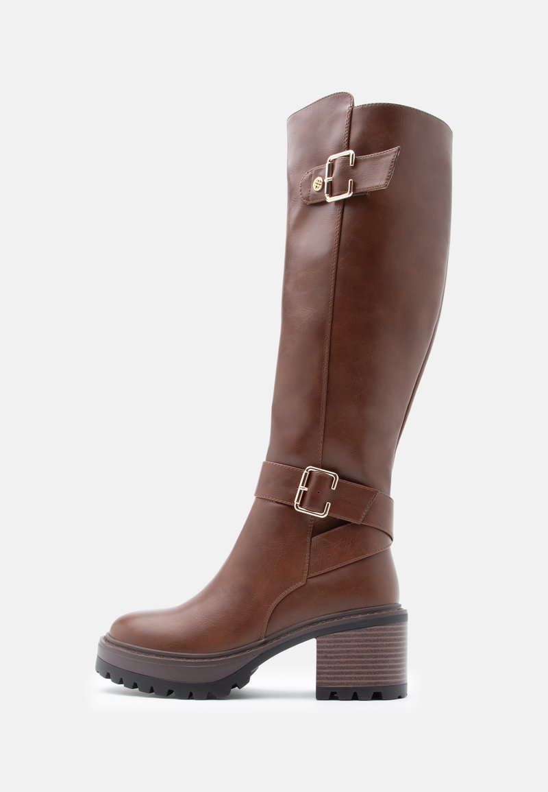 Brown leather knee-high boot with a round toe, buckle accents, and a textured block heel. Rubber sole offers traction.
