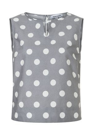 Blouse grise sans manches avec de grands pois blancs et un petit détail d'encolure en forme de trou de serrure à l'avant.