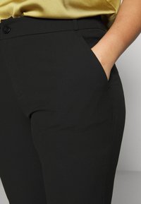 ONLY Carmakoma CARRIDE PANTS - Nohavice - black
