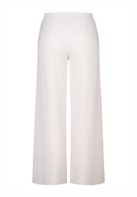Lichtbeige wijde broek met een ribbelstructuur en elastische tailleband, die een ontspannen fit biedt met uitlopende benen.