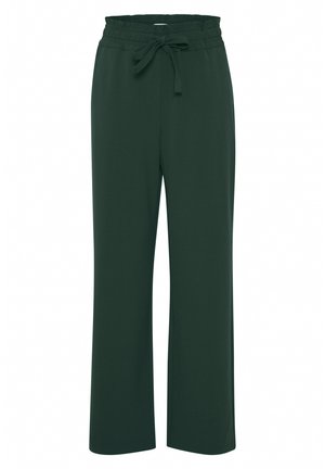 Grüne weite Hosen mit weichem Textil, ausgestattet mit einem elastischen Bund und einem gebundenen Schleifenkabel für eine verstellbare Passform.