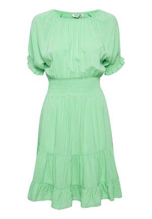 Minta zelena obleka s kratkimi nabranimi rokavi, nabranim dekoltejem in nabrano obrobe za lahkotno silhueto. Gladka tkanina, lahka zasnova.