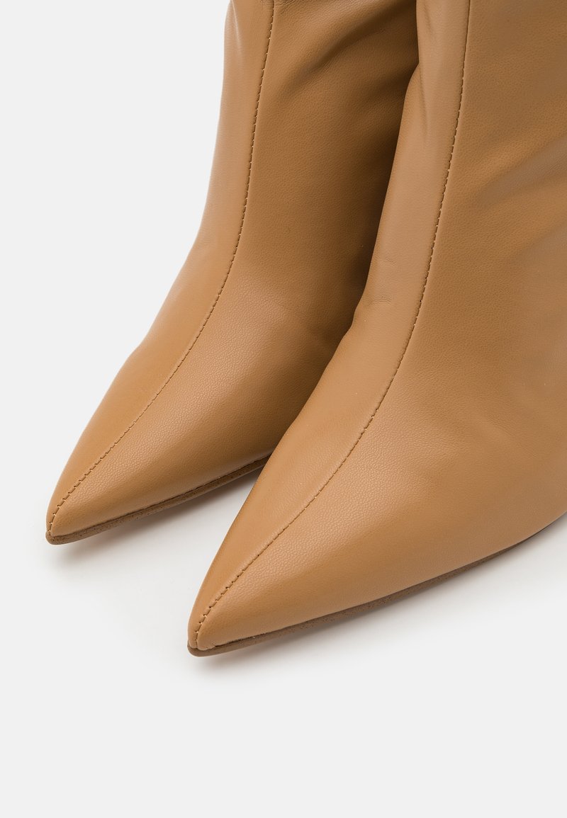 steve madden brown wedge boots