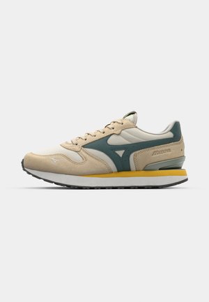 Beige and teal sneakers featuring a combination of suede and mesh, round toe, yellow midsole, and a rubber outsole. Minimal branding detail.