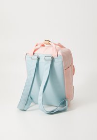 Two-tone backpack featuring a pink upper portion and a light blue lower section. Constructed from durable fabric with adjustable straps.