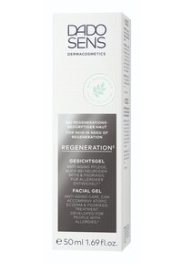 Gesichts-Gel-Verpackung in einer vertikalen Box, mit einem weißen strukturierten Hintergrund, silbernen und grünen Akzenten sowie zweisprachigen Produktinformationen.