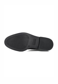 Sole of a black dress shoe with textured grip area, rectangular brand logo, and shoe size "38" marked near the arch.