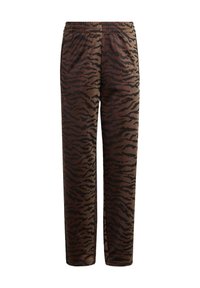 Smeđe trenirke s uzorkom crnih pruga tigra, elastičnim pojasom i suženim nogavicama. Mekani materijal glatke teksture.