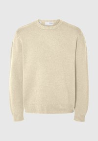 Ljus beige stickad tröja med rund halsringning, långa ärmar, ribbade muddarna och kant. Slät textur med ett medeltjockt mönster.