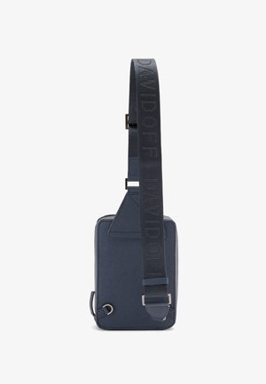 Navy blue sling bag made of textured material, featuring a broad, embossed strap with 'DAVIDOFF’ logo and minimalistic design.