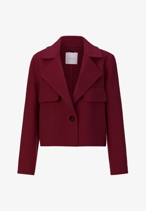 Burgundy cropped jacket with a notched collar, front button closure, and two large patch pockets. Soft texture and tailored design.
