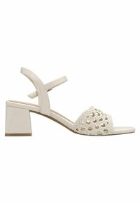 Sandale à talon bloc en cuir blanc avec un dessus tressé, une bride de cheville ajustable et un design à bout ouvert. Texture lisse avec une finition mate.