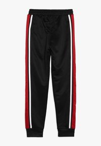 Jordan Pantalones deportivos - black