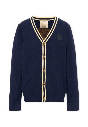 Cardigan azul marino con ribete color crema, cinco botones de madera, puños y bajo acanalados, y un pequeño parche con logo negro en el pecho.