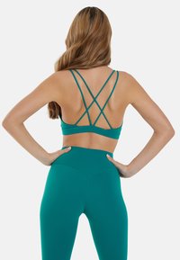 SQUATPROOF Top - teal
