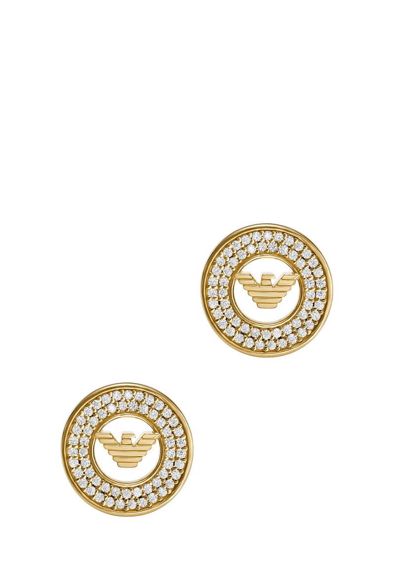 Orecchini circolari in oro con un logo centrale e circondati da una fila di brillanti strass bianchi. Finitura liscia e lucida.
