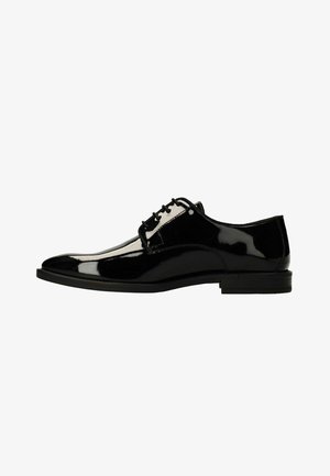 Black patent leather lace-up dress shoe with pointed toe and low stacked heel, shown in profile against a white background.
