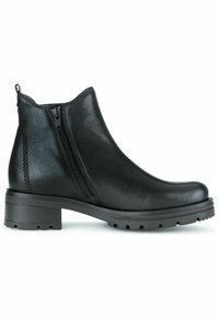 Bottine en cuir noir avec fermeture éclair latérale, finition texturée, petit talon bloc et semelle crantée pour une meilleure traction. Design simple avec détails de couture.
