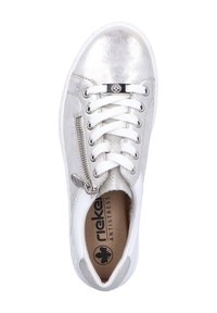 Silver synthetic sneaker with white accents, round toe, lace closure, side zipper, and padded insole labeled "rieker ANTISTRESS."