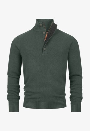 Sötétzöld pulóver magas gallérral, félig cipzárral és három gombbal. Bordás mandzsetta és alj, puha kötött anyagból készült.