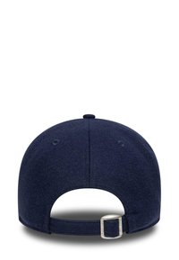 Navy blue cap with a soft texture, adjustable metal buckle closure, and ventilation eyelets on the back. Round, structured shape.