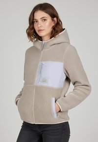 Beige fleece jacket with a hood and a light blue panel. Features a zippered chest pocket, dual side pockets, and textured fabric.