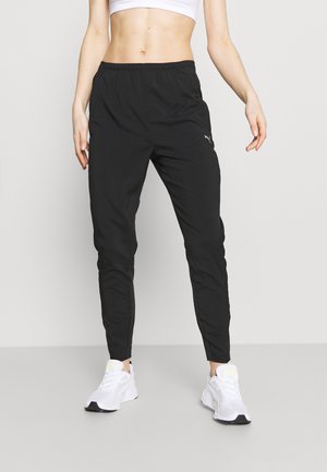 RUN TAPERED PANT - Tracksuit bottoms - black