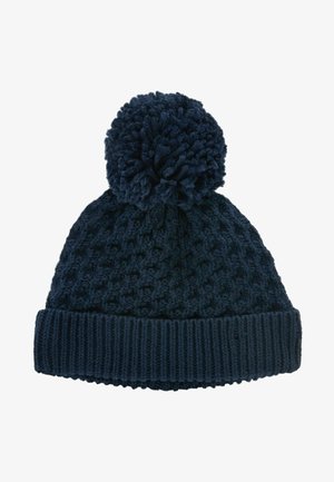 Gorro de punto azul marino con un patrón texturizado, puño acanalado y un gran pom-pom en la parte superior. Hecho de hilo suave, que proporciona calidez y comodidad.
