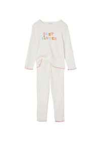 Cream-colored long-sleeve top and pants set for children with "BEST SISTER" text in pastel colors and pink ruffled edges on sleeves and hems.