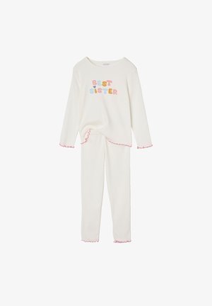 Cremfarbener Langarm-Top und Hosen-Set für Kinder mit dem Text "BESTE SCHWESTER" in Pastellfarben und pinken Rüschen am Ärmel und Saum.