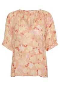 Blouse florale en tissu léger et transparent. Présente un col en V, des manches courtes et un fond pêche avec des motifs floraux roses, jaunes et rouges.