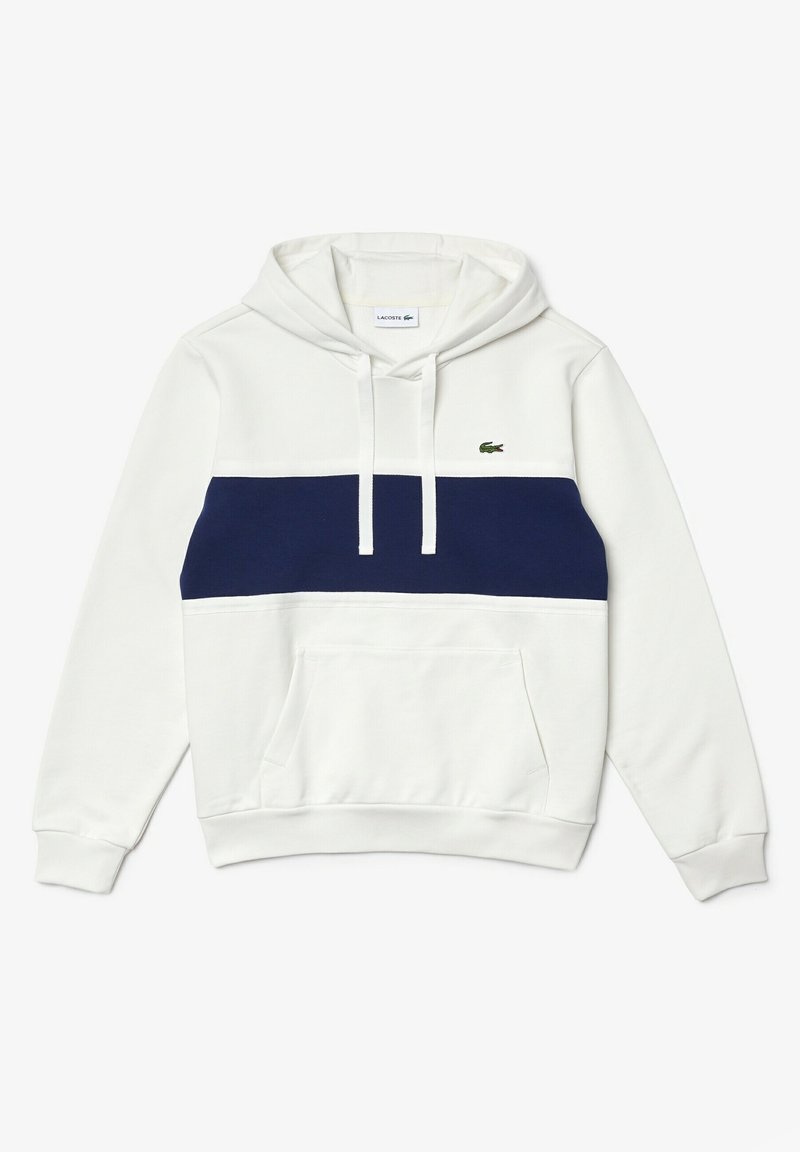 Bílá mikina s kapucí se navy horizontálním pruhem přes hruď. Obsahuje klokaní kapsu, nastavovací kapuci se šňůrkou a vyšívané logo.