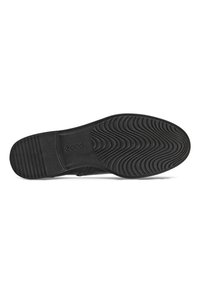 Suela de zapato negra con un patrón de ondas texturizado, material de goma y un logotipo de marca prominente. Diseño plano con un ligero arco para soporte.