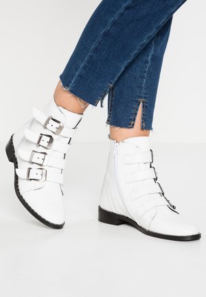 Bottines de cowboy / motard - white