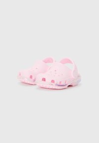 Pink clogs made of flexible material, featuring ventilation holes, heel strap, and a translucent sole with decorative accents.