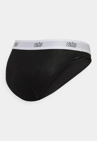 Sous-vêtements en coton noir avec une ceinture élastique blanche arborant le logo "cache coeur". Texture lisse et forme ajustée, conçue pour le confort.