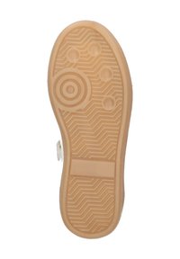 Rubber shoe sole in beige with a textured zigzag pattern, circular tread accents, and a flat base. Features pronounced grip elements.
