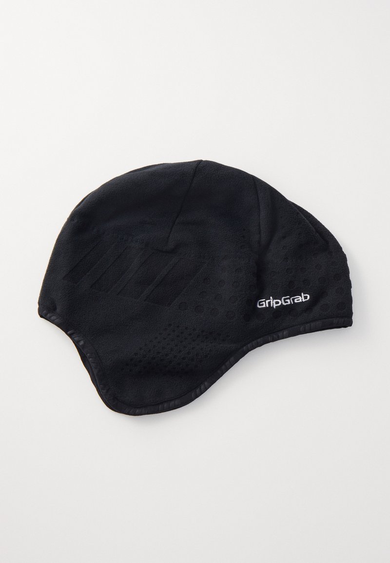 Black cycling cap made of soft, textured fabric. Features a dot pattern and logo detail on the side. Flexible shape for close fit.