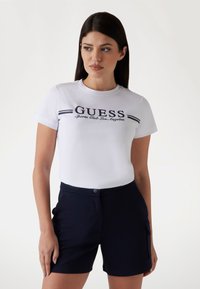 Guess Marškinėliai su spaudiniu - blanc