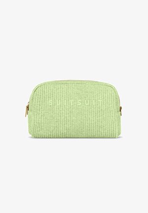 Green woven cosmetic bag with a rounded shape, textured surface, and embossed brand name, featuring a gold zip and pull tab.