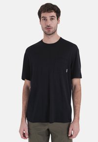 Black short-sleeve t-shirt made of soft fabric featuring a chest pocket and a crew neckline, displayed on a plain background.
