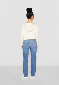 GAP VINTAGE - Calças de ganga à boca de sino - medium sonoma